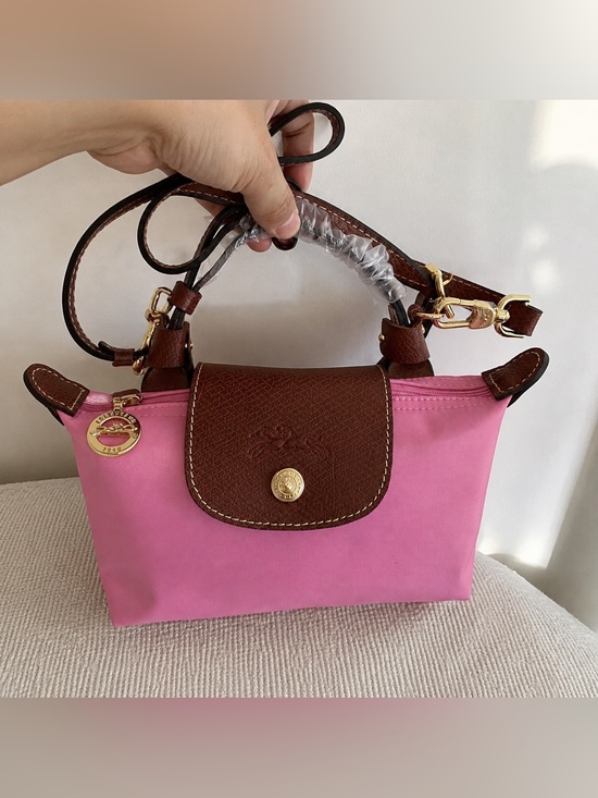 Longchamp Handbags - Longchamp Pink Nylon Mini Handbag with Brown Leather Flap